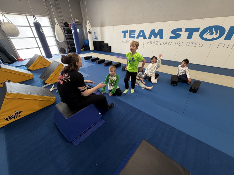 Coach leading a kids Ninja Fit class at Stoic Martial Arts in Chanhassen, Minnesota